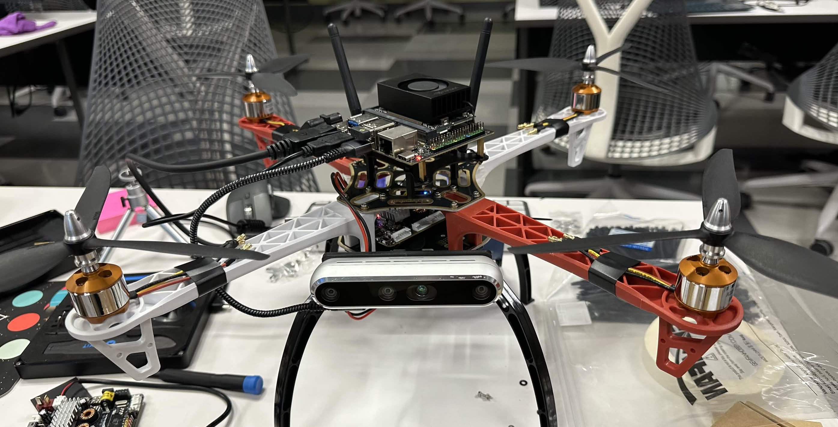 Autonomous drone prototype with an onboard Raspberry Pi, camera, and 3D-printed mounts
